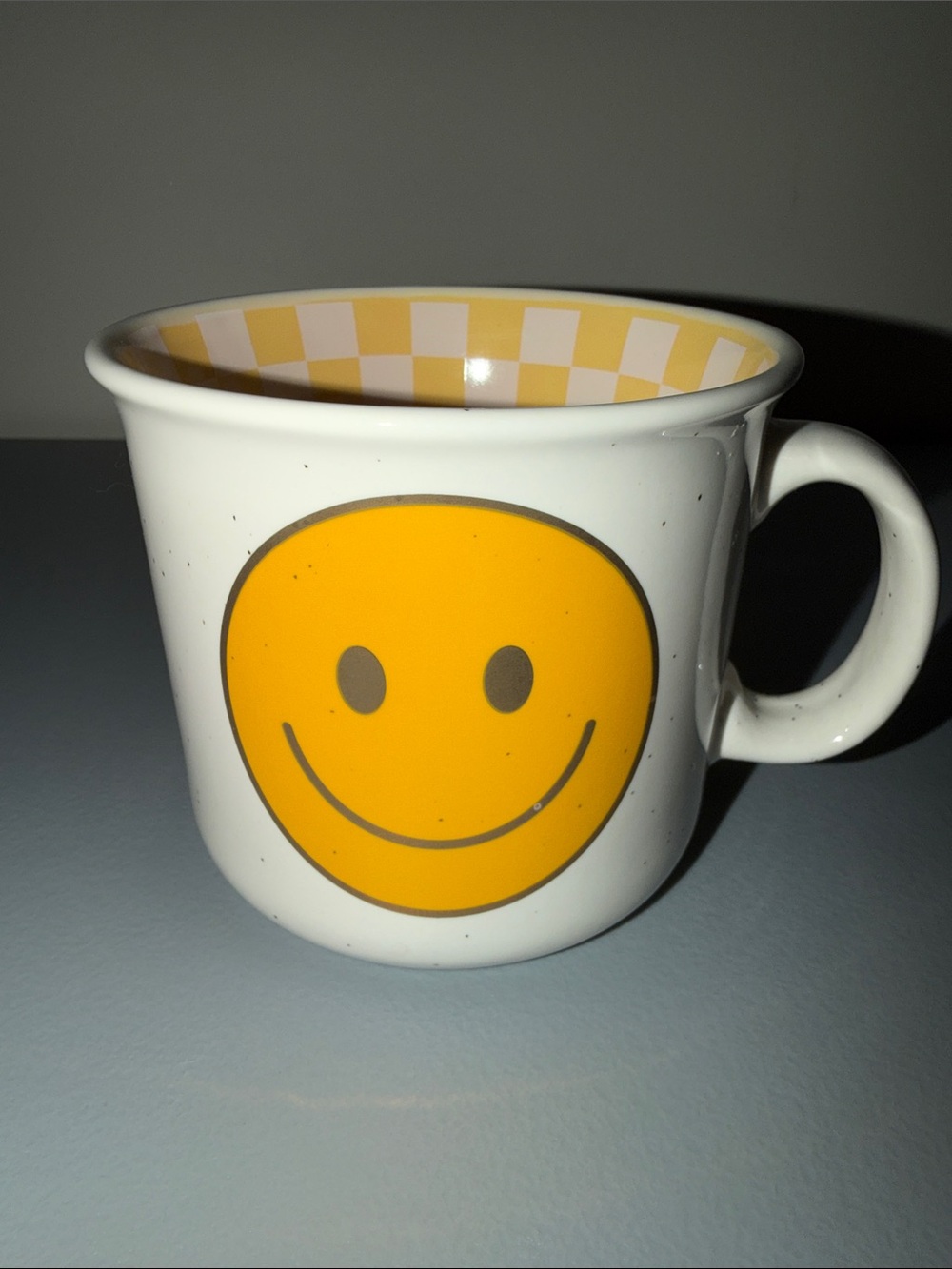 White Mug with Yellow Smiley Face - Cheerful Ceramic Coffee Cup